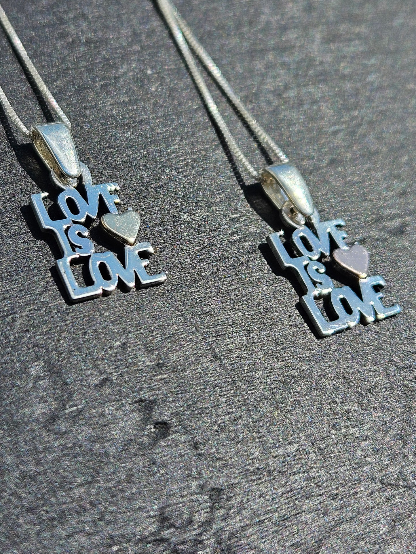 "Love Is Love" Pendant. Silver and 14kt Gold.